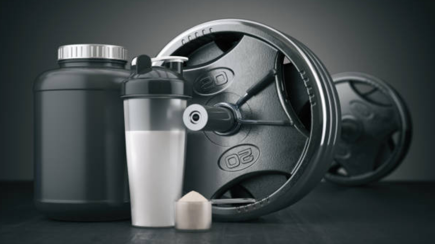 Man mixing creatine into a post-workout protein shake for muscle growth